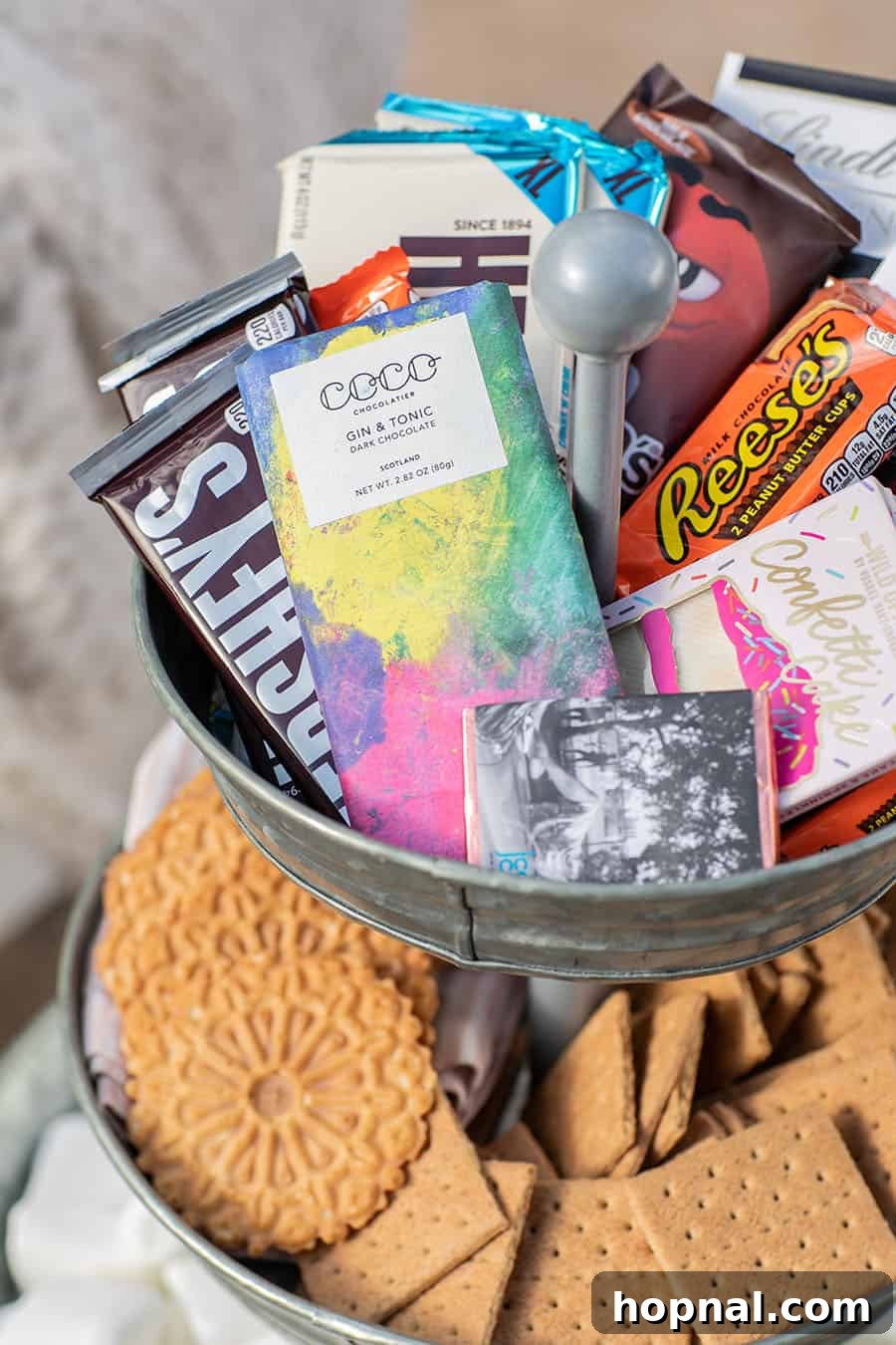 Elevate Your Decor: Tiered Galvanized Tray Ideas 11 A close-up photograph highlighting an inviting assortment of chocolate candy bars, perfect for a customizable s'mores experience.