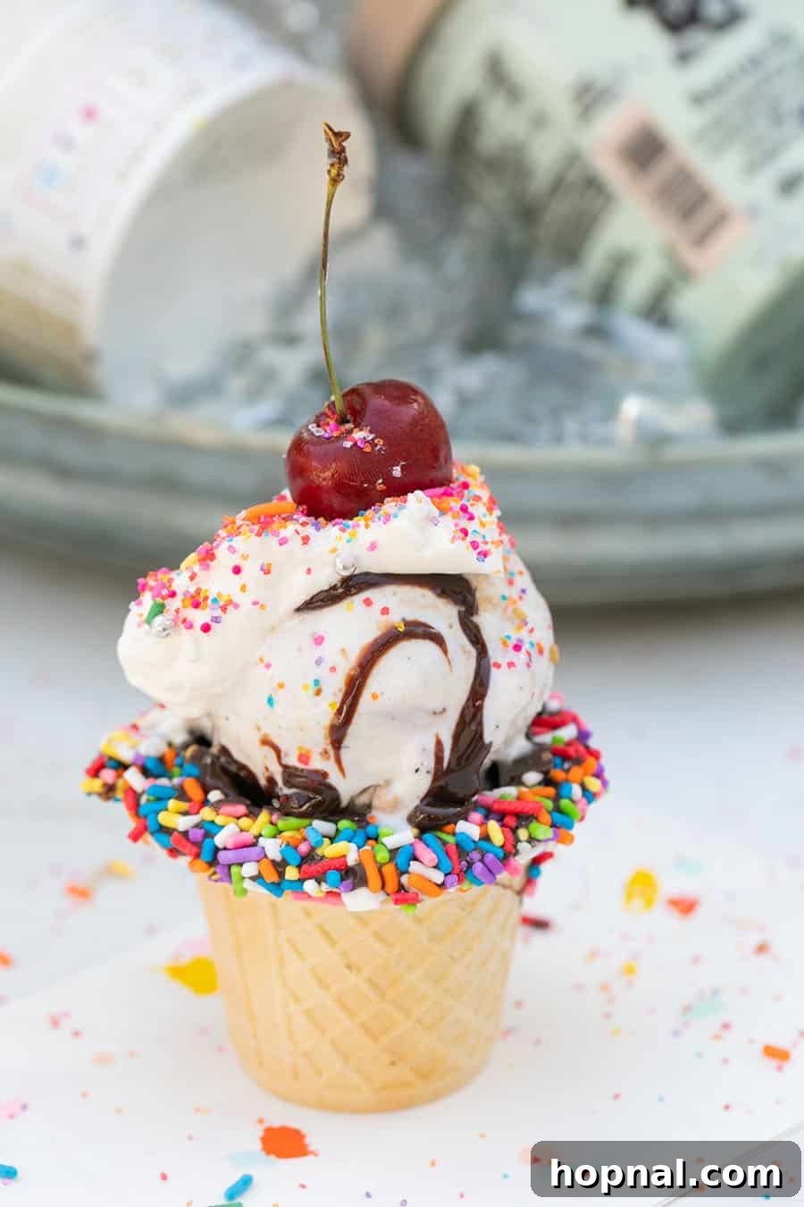 Elevate Your Decor: Tiered Galvanized Tray Ideas 9 A delectable mini ice cream sundae, perfectly crafted with a vibrant cherry on top, showcasing the tempting results of a well-stocked ice cream bar.