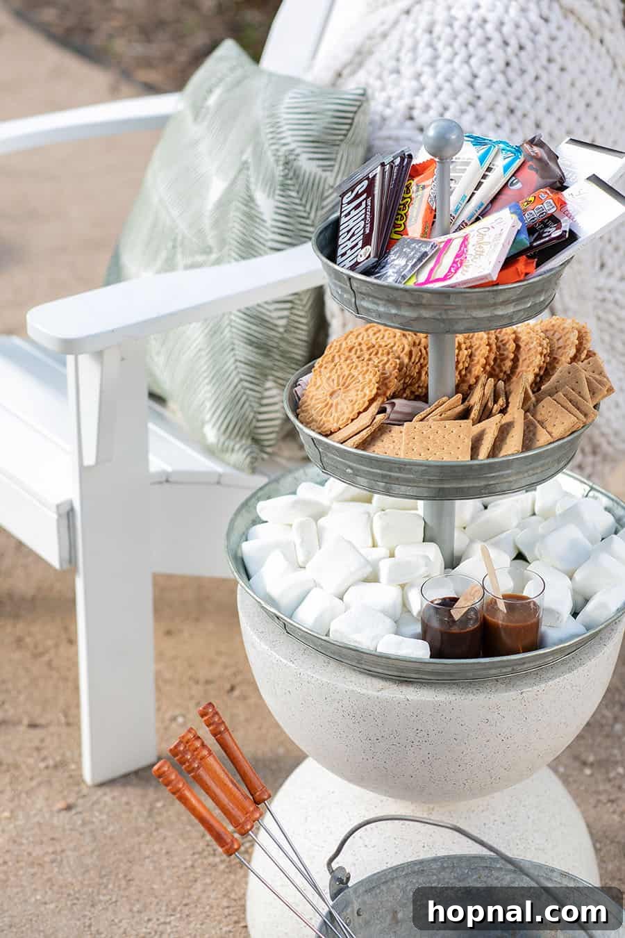 Elevate Your Decor: Tiered Galvanized Tray Ideas 10 A tempting tiered galvanized tray, with an assortment of chocolate candy bars on the top tier, classic graham crackers in the middle, and fluffy marshmallows ready for roasting at the bottom.