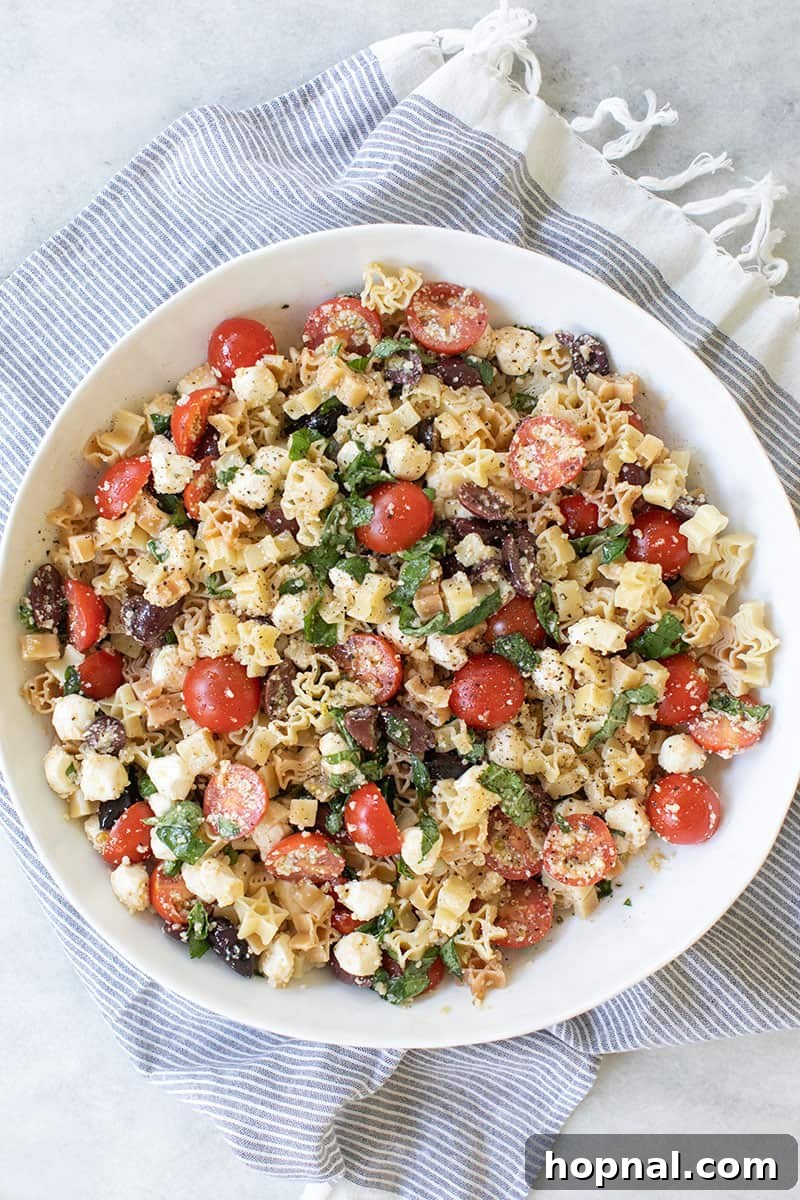 A close-up shot of the Summer Pasta Salad, showcasing its inviting texture and fresh ingredients.