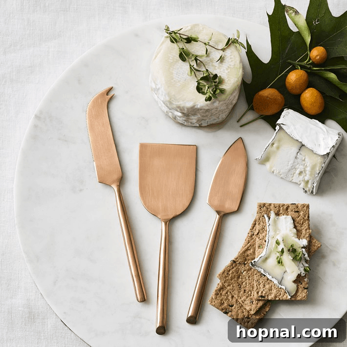 Chic copper cheese knives, ideal for a refined tropical cheese board.