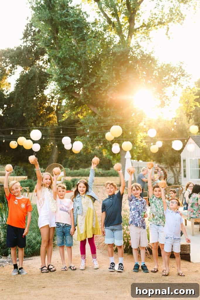 Children happily holding coconuts at a tropical party, excited by the themed activities.