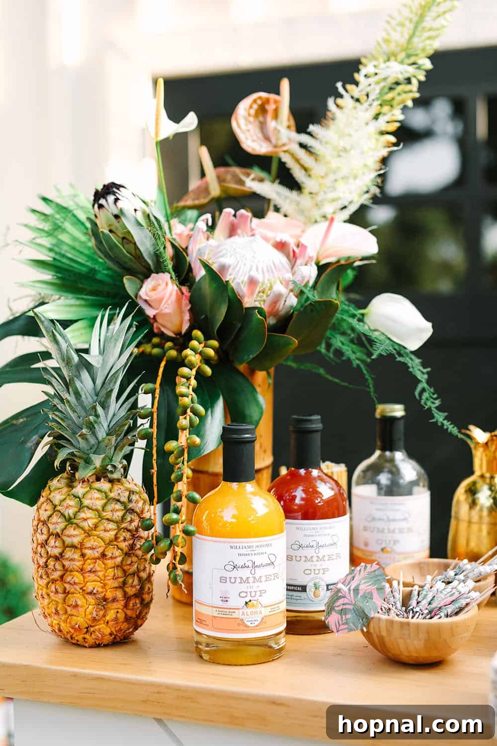 Assortment of vibrant tropical cocktail mixers from Williams Sonoma, ready to create delicious drinks.