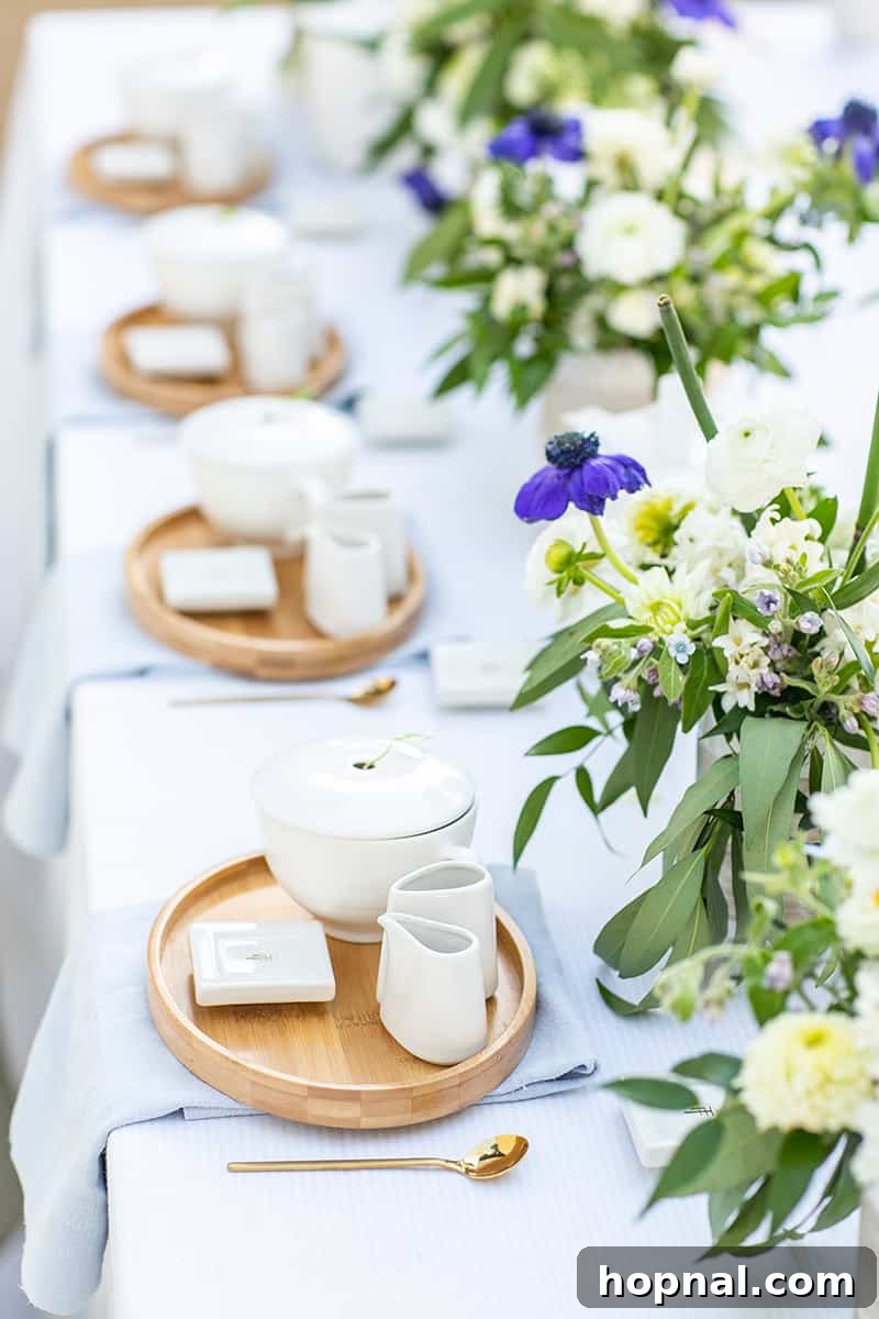 Elegant tea party setting with delicate cups, fresh flowers, and vintage decor, perfect for a bridal shower tea party.