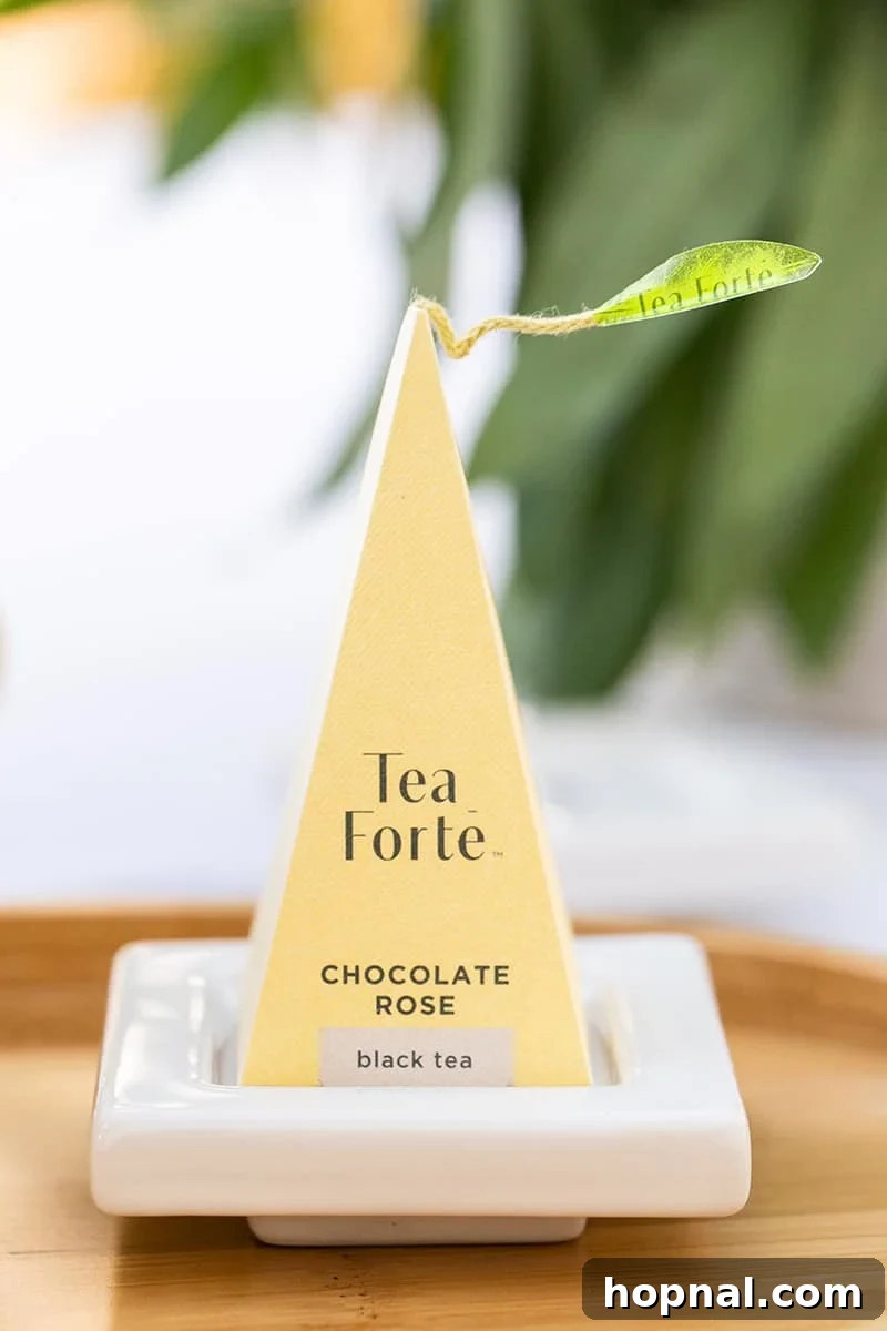 A delicate cup of rich Chocolate Rose Tea, beautifully presented, offering a unique and aromatic tea experience.