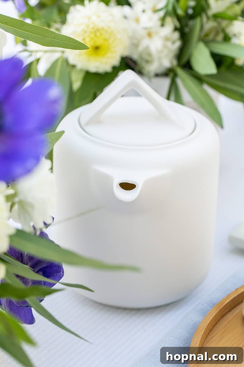 A sleek, modern electric tea kettle, symbolizing efficiency and elegance in tea preparation.