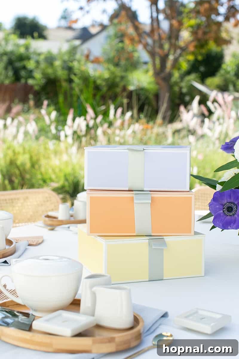 A stylish display of assorted tea boxes, stacked neatly on a table, inviting guests to choose their favorite blends.