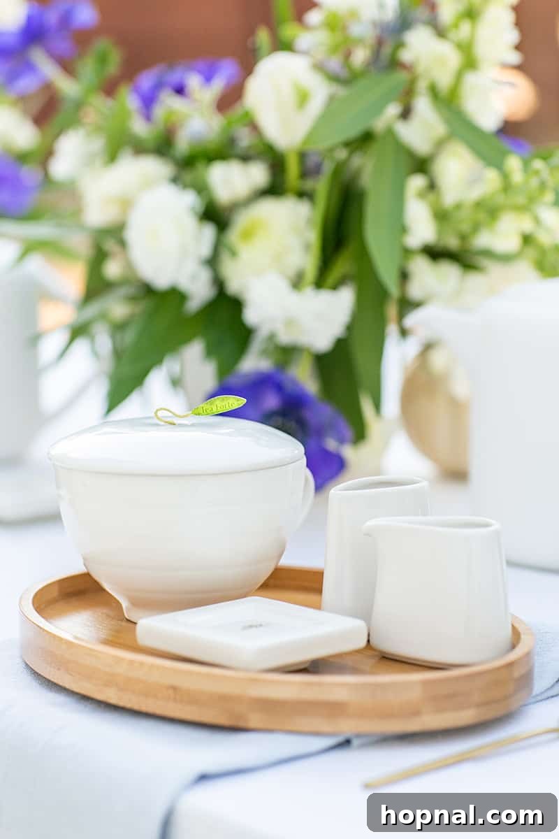 A delicate tea cup, elegantly placed at a table setting, symbolizing the refined aesthetic of a bridal shower tea party.