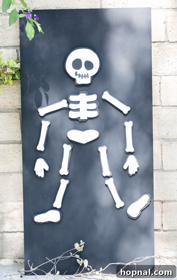 DIY skeleton magnet board, a fun and engaging Halloween game for children's parties, promoting creativity and fine motor skills.