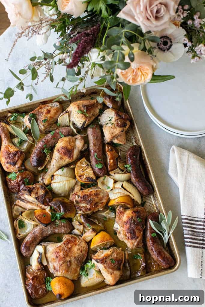 The perfect one-pan chicken and sausage meal, garnished with fresh herbs, ready to be served.