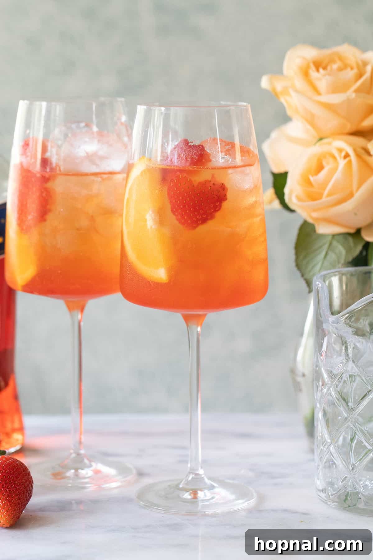 Festive Valentine's Day cocktails with Aperol and fresh strawberries.