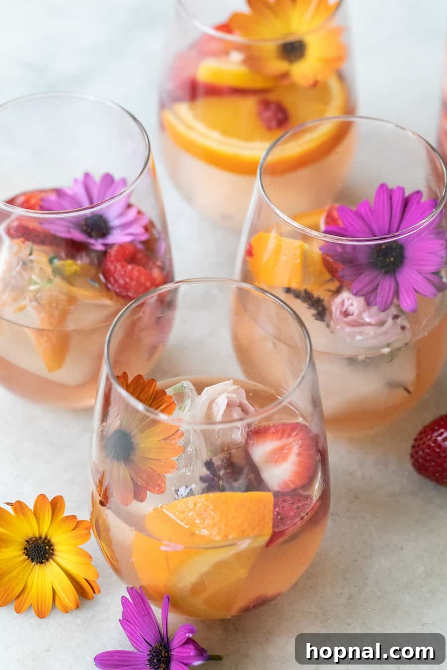 Beautiful Floral Sangria adorned with edible flowers, perfect for Valentine's Day.