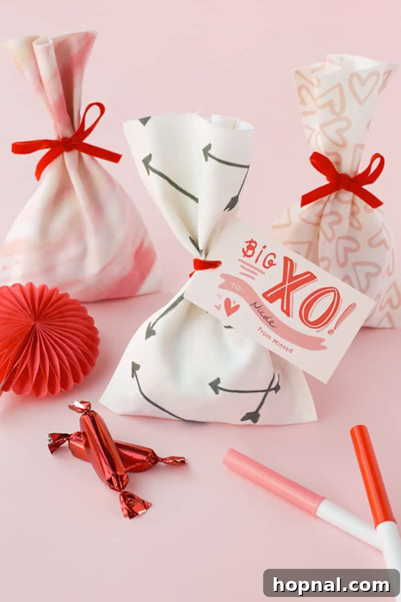 Heartfelt Creations: 14 DIY Valentine's Day Projects 14 Creative no-sew Valentine's Day bags decorated with arrows and hearts, perfect for holding treats.