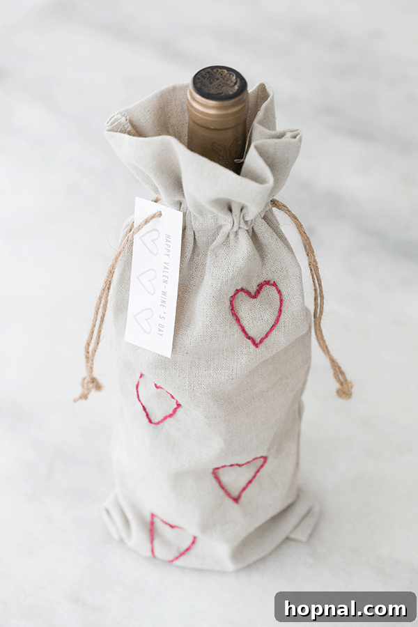 Heartfelt Creations: 14 DIY Valentine's Day Projects 3 Elegant DIY Valentine's Day embroidery wine bags with heart designs, ideal for personalizing wine bottle gifts.