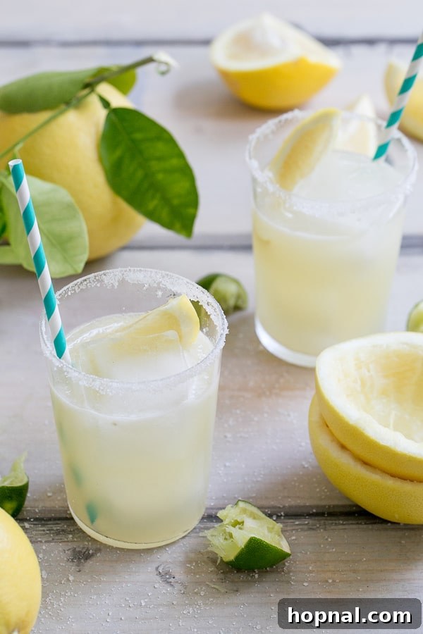 Yellow grapefruit margarita recipe, featuring a vibrant yellow color and a grapefruit slice garnish.