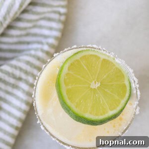 Margarita overhead photo with a lime wedge, showcasing a classic recipe