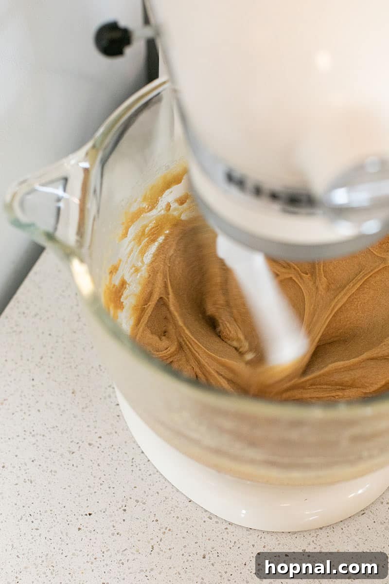 Your Secret to Irresistible Blondies 6 Mixing batter in a KitchenAid mixer - melted butter, large bowl