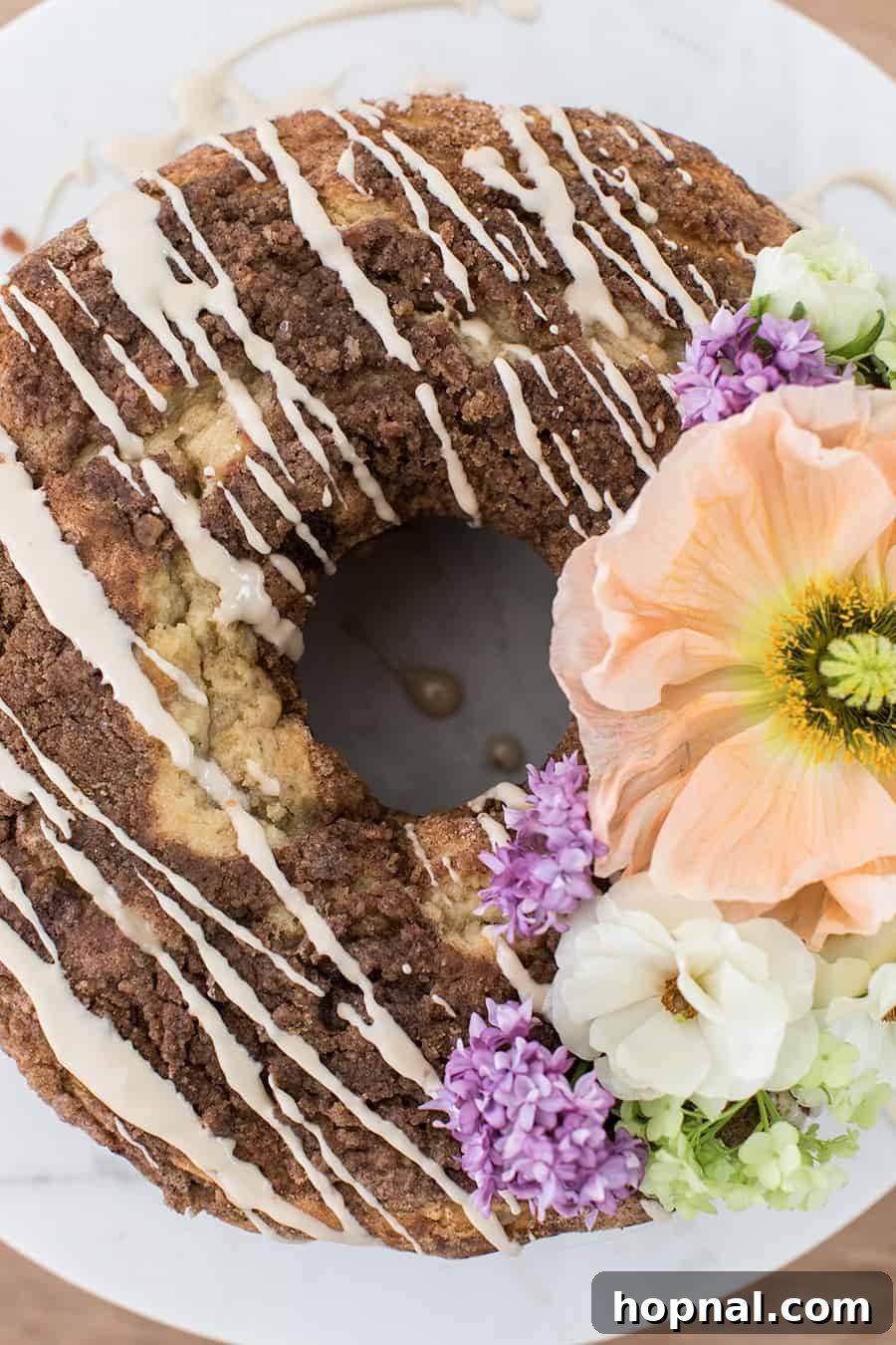 25 Heavenly Homemade Cake Creations 19 Coffee cake for brunch with delicate glaze and edible flowers.