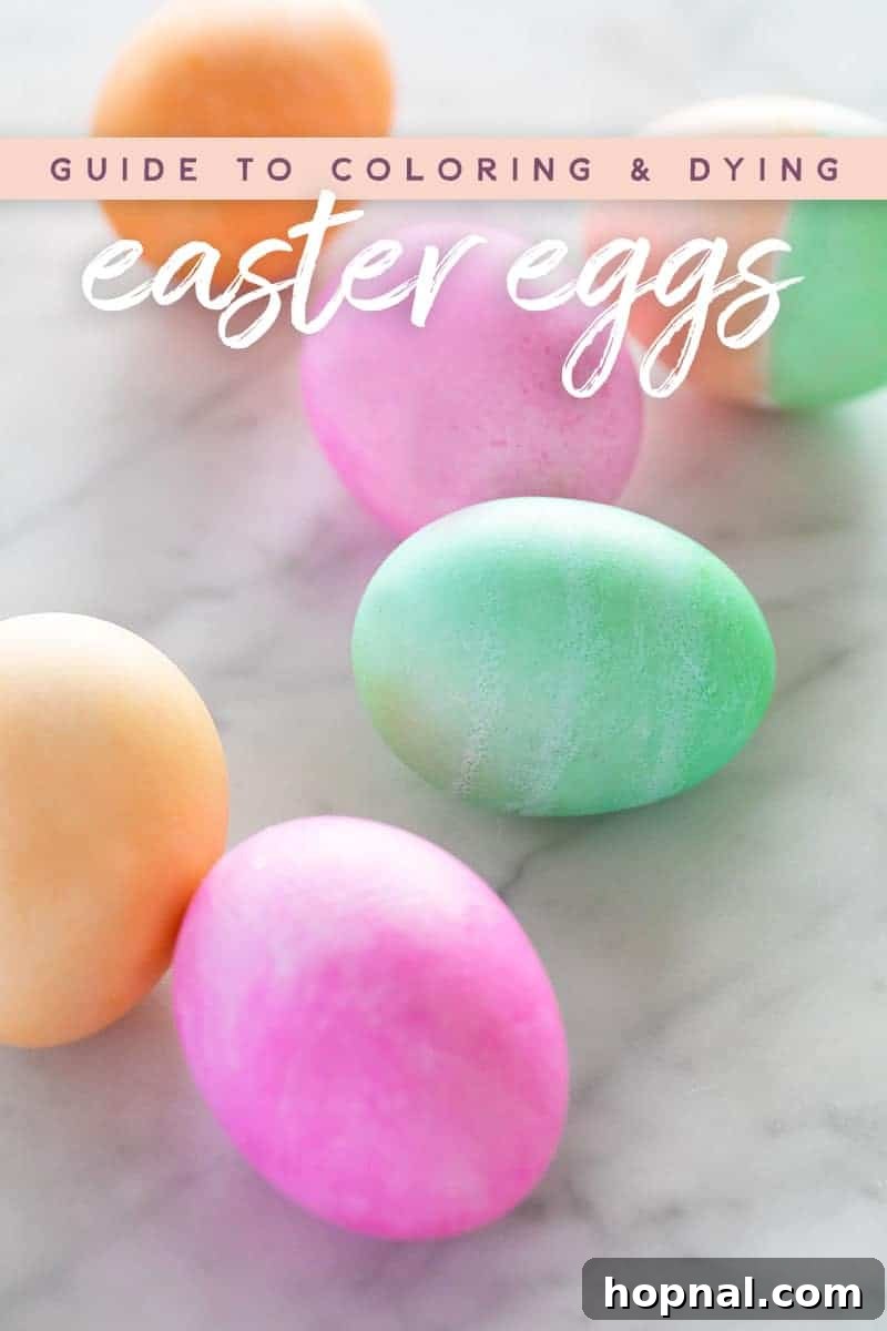 Mastering Easter Egg Dyeing and Design 2 colorful dyed eggs on a table