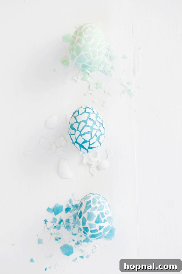 Mastering Easter Egg Dyeing and Design 14 Pink and purple ombre Easter eggs with delicate gold splatter.