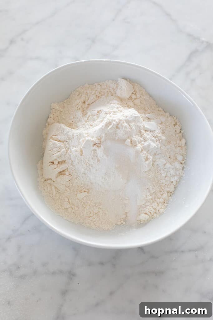 A bowl filled with finely sifted all-purpose flour, ready for baking the perfect homemade brownies.