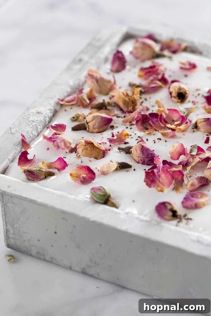 Rose Petal Clouds 14 Homemade marshmallows in a 6x6 baking pan with rose petals over the top.