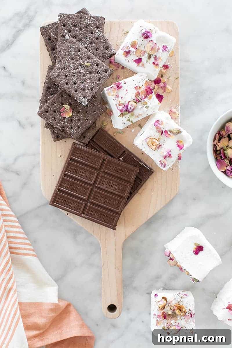 Rose Petal Clouds 21 Cutting board with chocolate, giant marshmallows and rose petals.