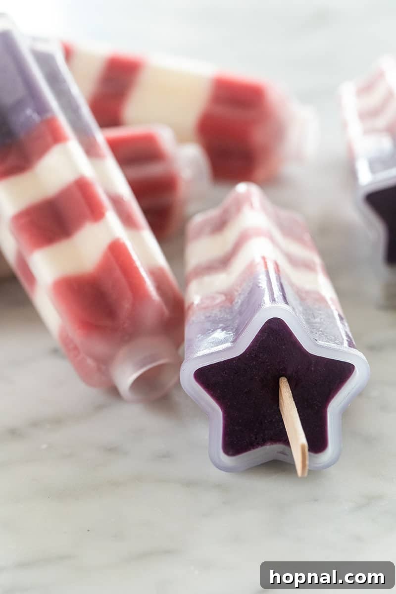 A star-shaped popsicle mold, empty and ready for filling, highlighting the fun shapes achievable for homemade frozen treats.