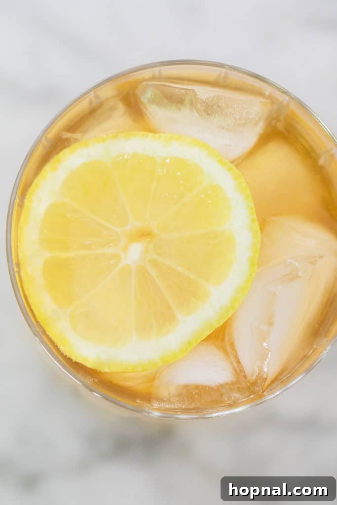 Craft Your Perfect Arnold Palmer 5 A refreshing Arnold Palmer served in a glass on a sunny day.