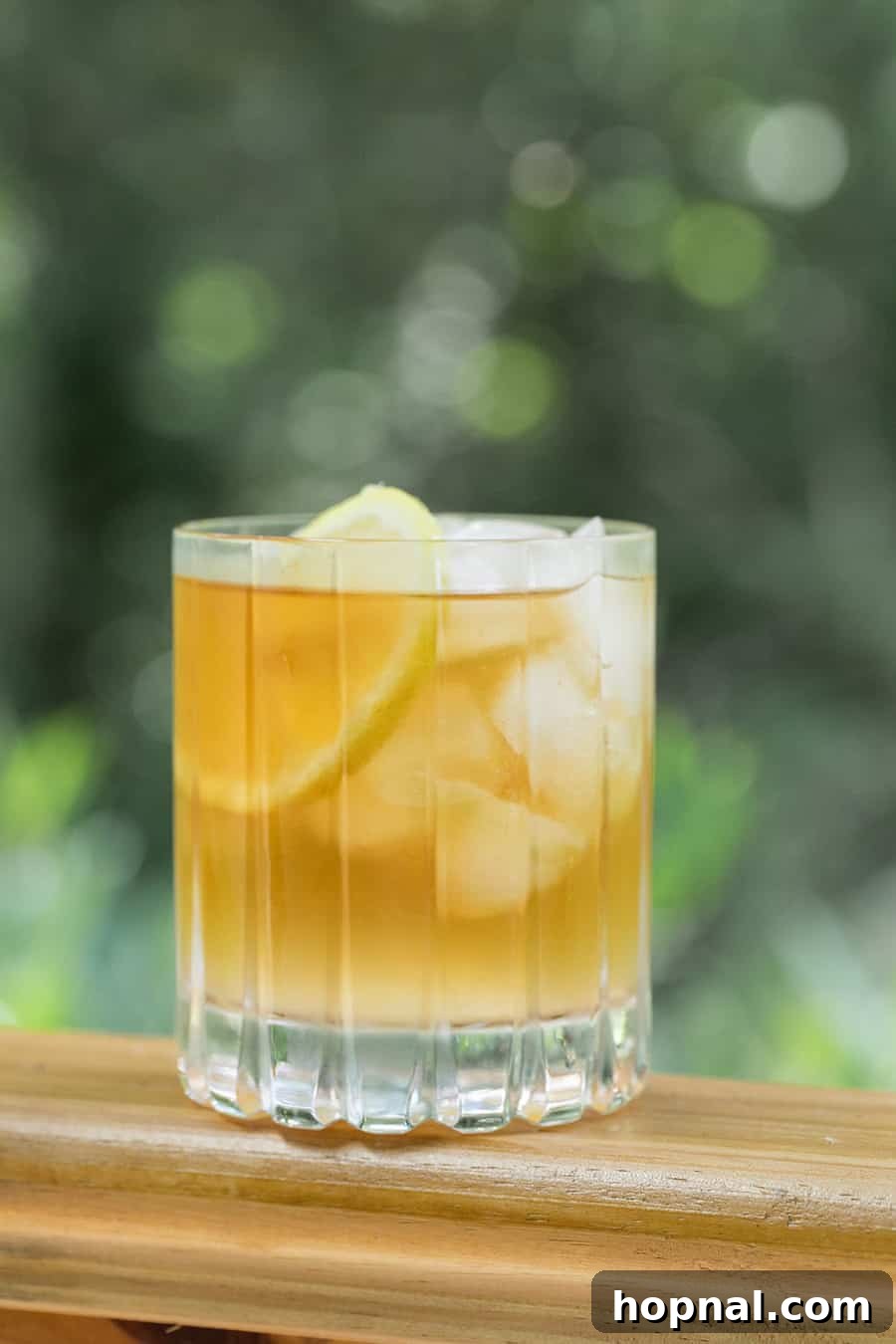 Craft Your Perfect Arnold Palmer 6 Arnold Palmer drink on a patio table, ready to be enjoyed