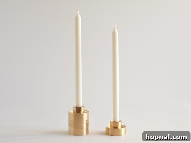 Hygge Your Home, Hygge Your Life 6 Elegant brass candle holders featuring delicate taper candles, adding a touch of sophistication.