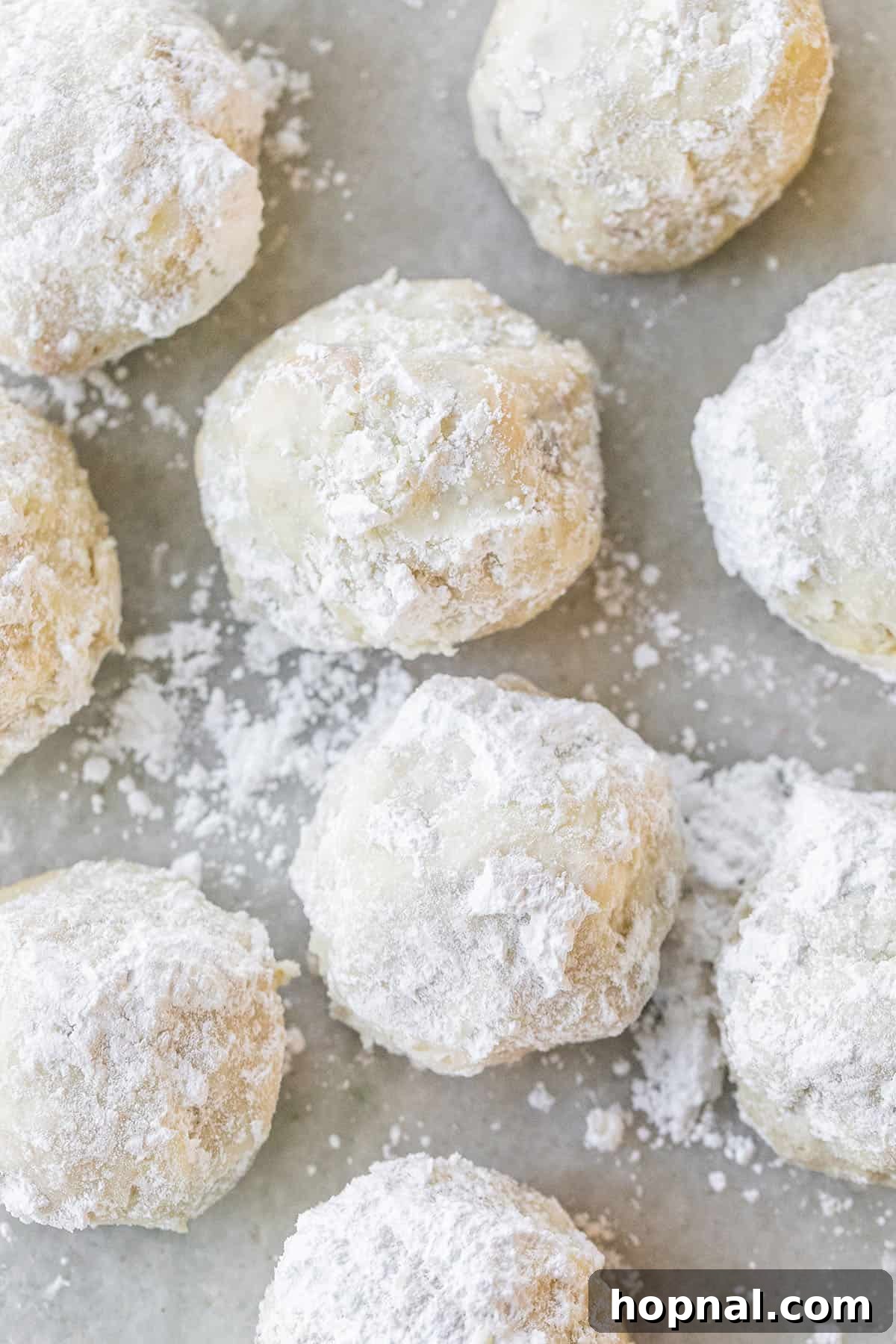 Melt-in-your-mouth snowball cookie recipe covered in powdered sugar