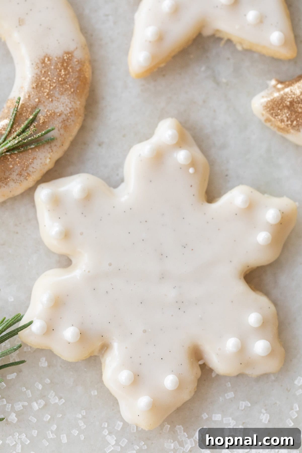 Buttery Christmas cutout cookies in various festive shapes
