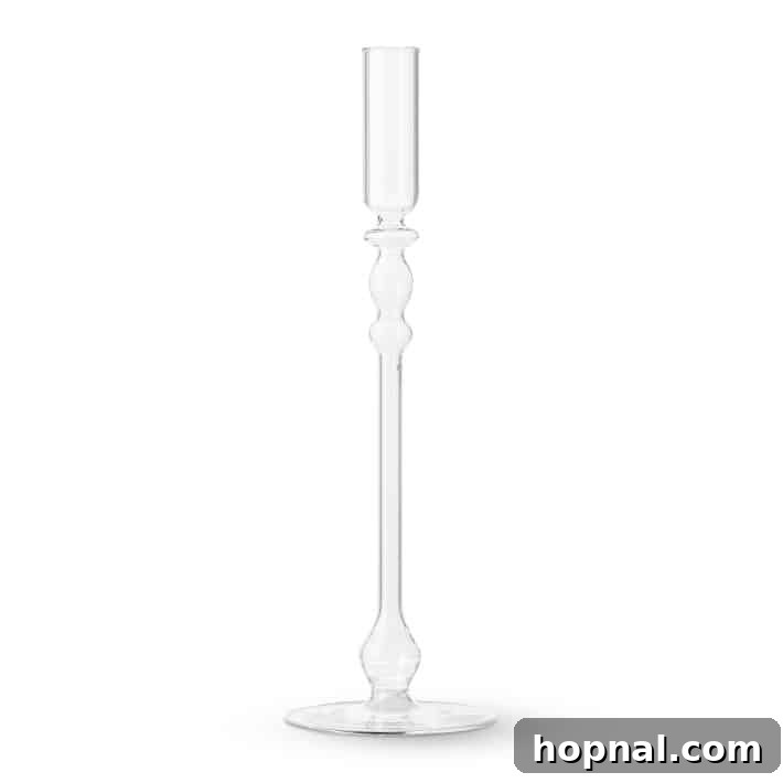 Sparkling Christmas Tablescapes 19 Our luminous candle holder from Williams Sonoma, a hollow glass design perfect for Christmas table decorations.