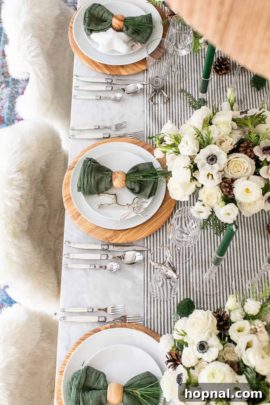 Sparkling Christmas Tablescapes 3 A festive Christmas table setting, meticulously adorned with modern woodsy-themed decorations, ready for a holiday gathering.
