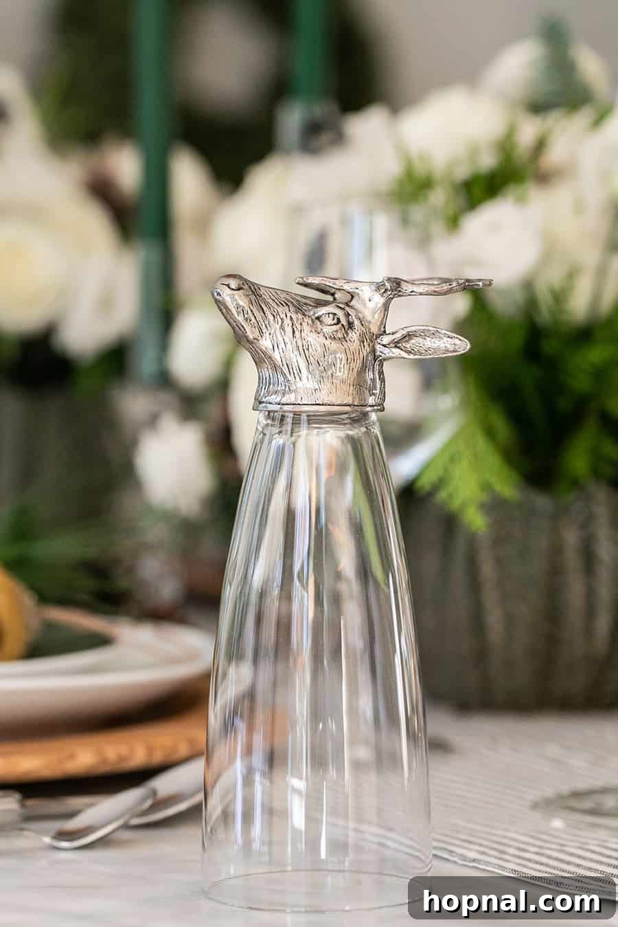 Sparkling Christmas Tablescapes 9 Elegant deer antler cups from Williams Sonoma arranged on a beautifully decorated Christmas table, adding a unique, rustic touch.