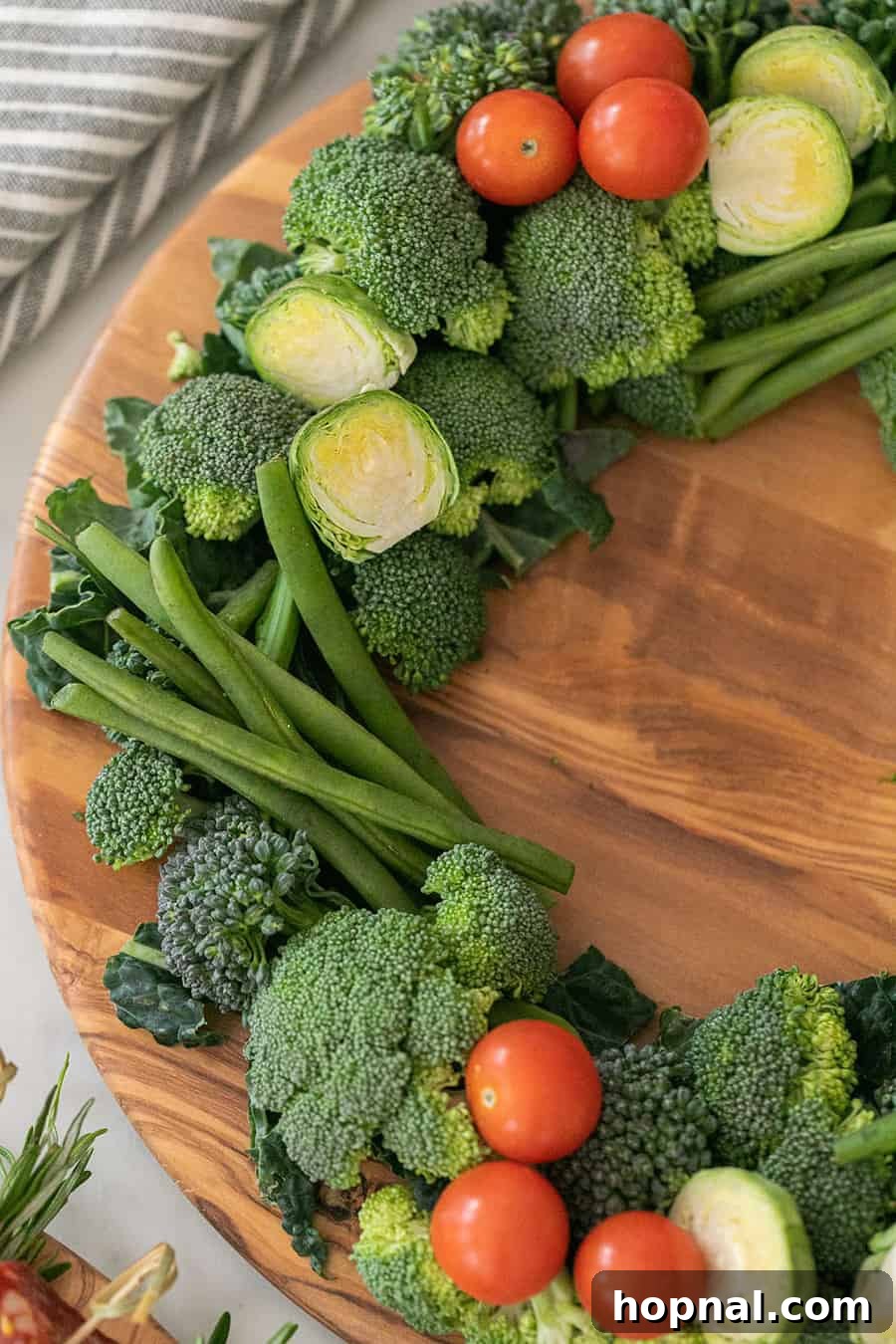 Broccoli, green beans, and tomatoes to make a wreath.