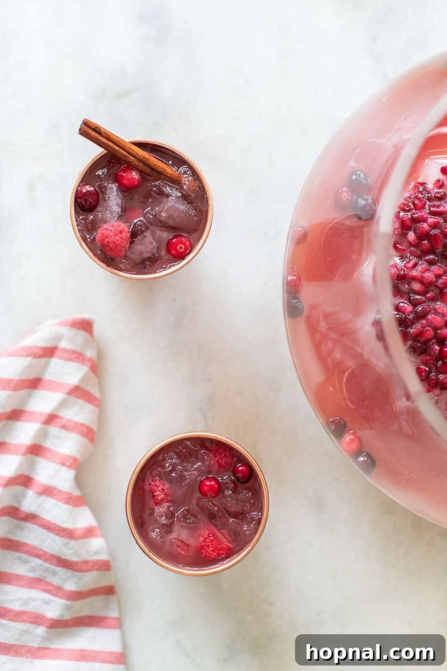 Large pitcher of easy cranberry punch for a Christmas party.