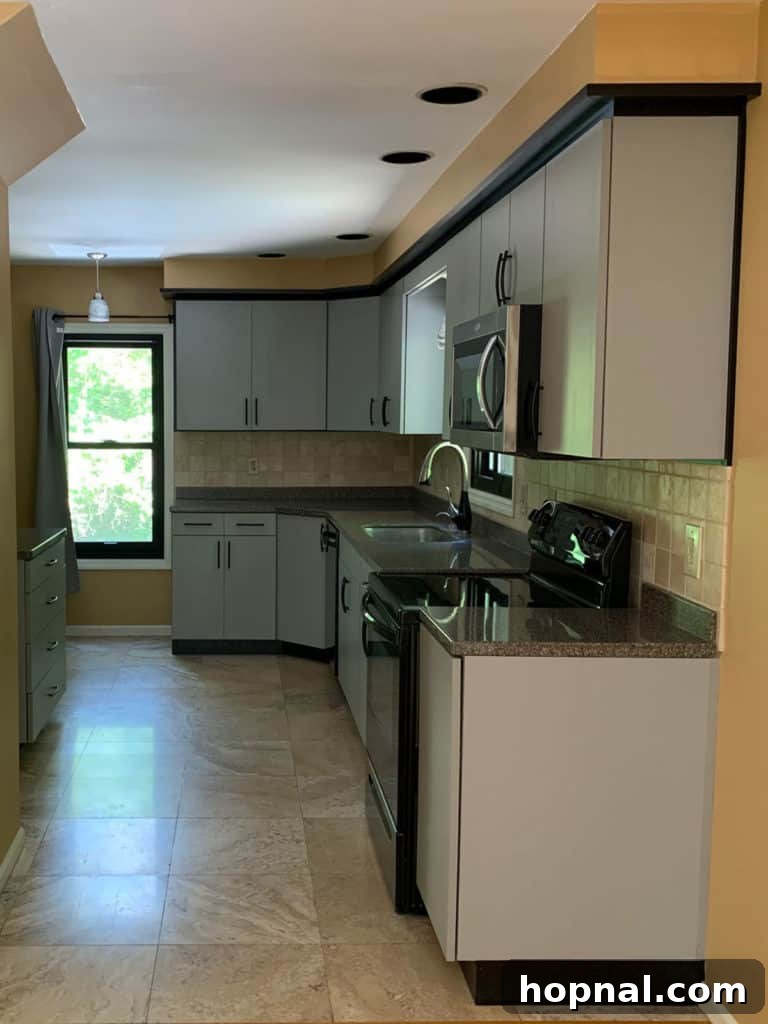 Tiny Kitchen Big Impact 4 Before image of kitchen showing old countertops and cabinetry
