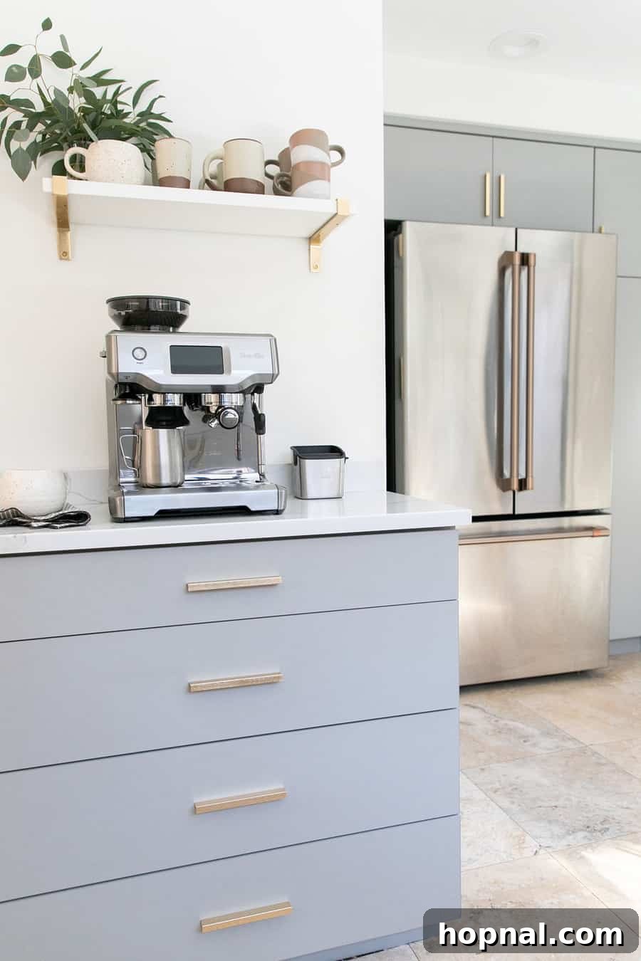 Tiny Kitchen Big Impact 9 Gray kitchen cabinets, gold pulls, cafe appliances and espresso maker in updated kitchen