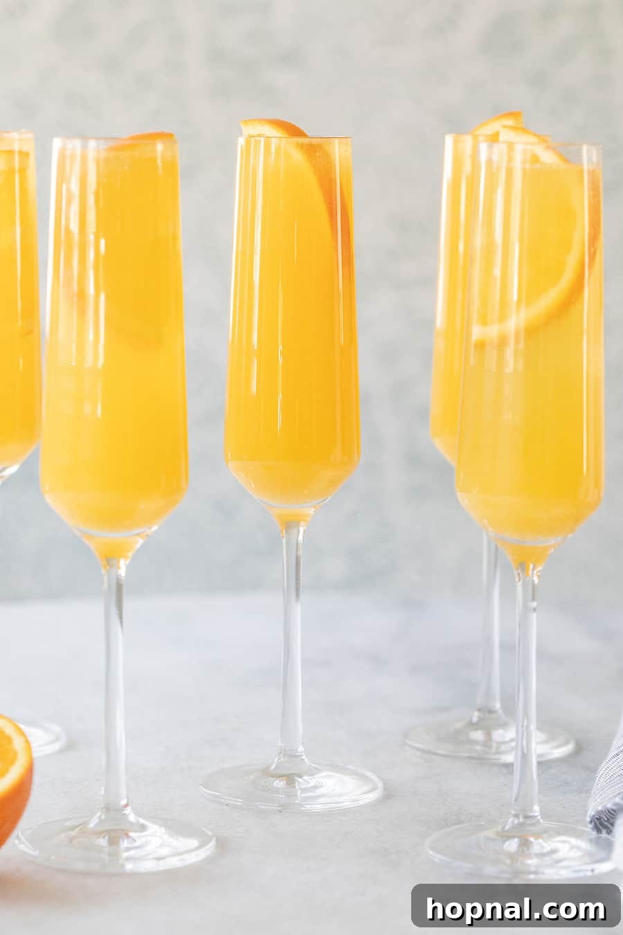 Mimosa recipe in a Champagne flute, showcasing a beautiful, ready-to-drink cocktail.