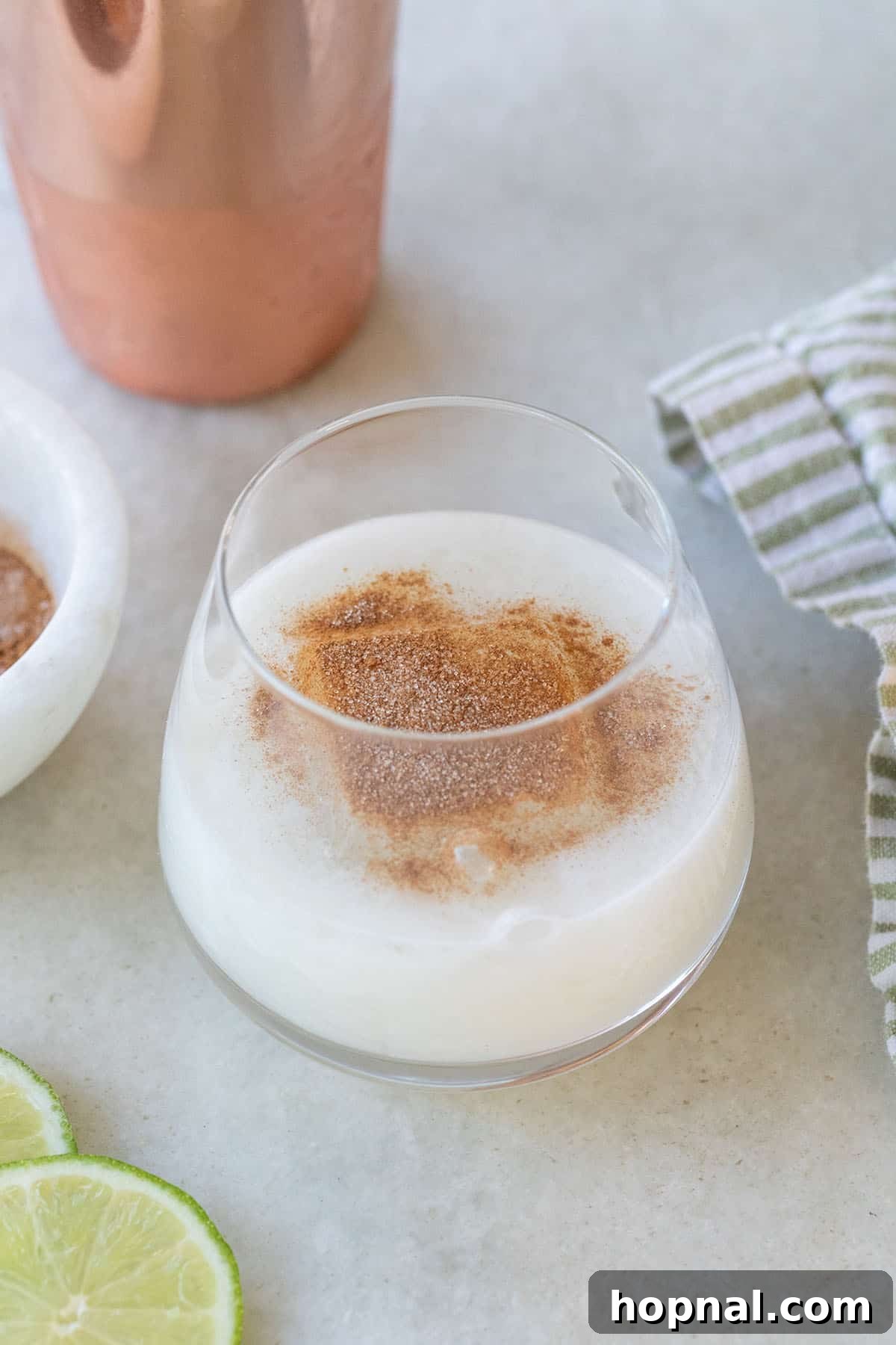 3 Ingredient Coconut Margarita in a coupe glass with a lime wheel garnish, a tropical tequila drink.