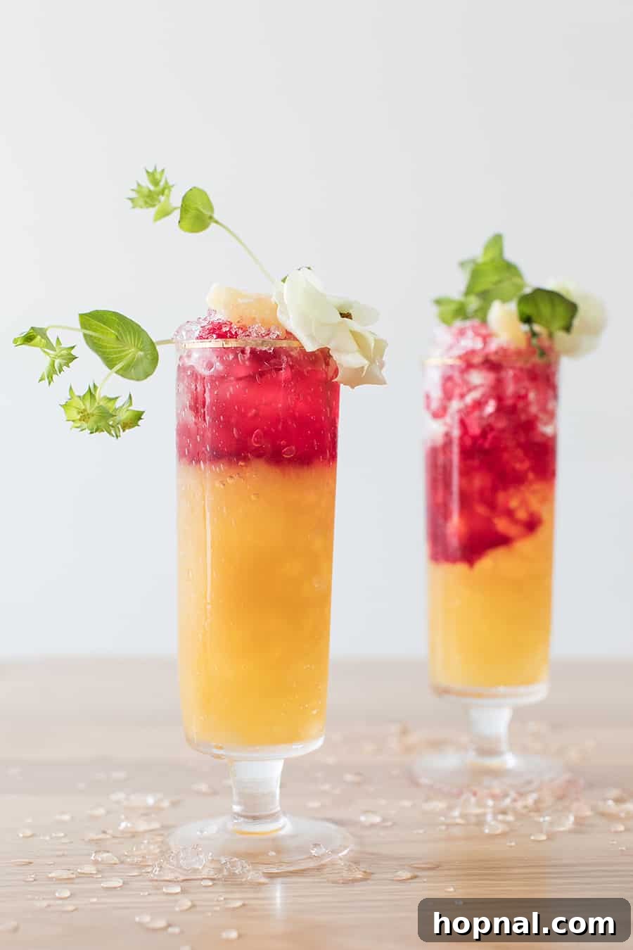 Pineapple Tequila Cocktail with a vibrant color, garnished with a pineapple wedge and leaf.