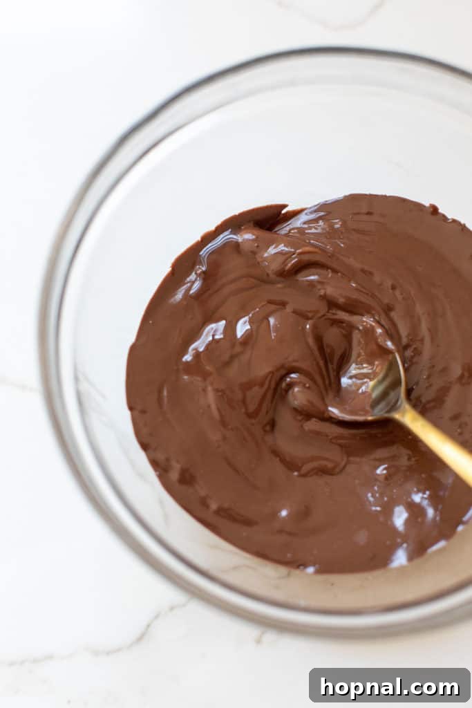 Melted chocolate to make chocolate covered strawberries.