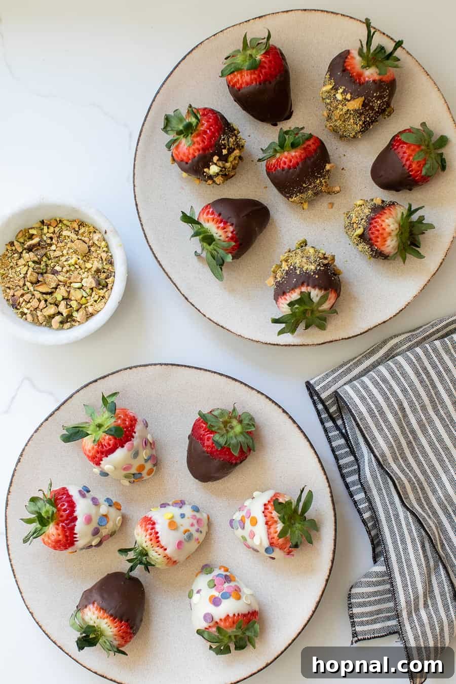 Chocolate-covered strawberries with colorful sprinkles. 
