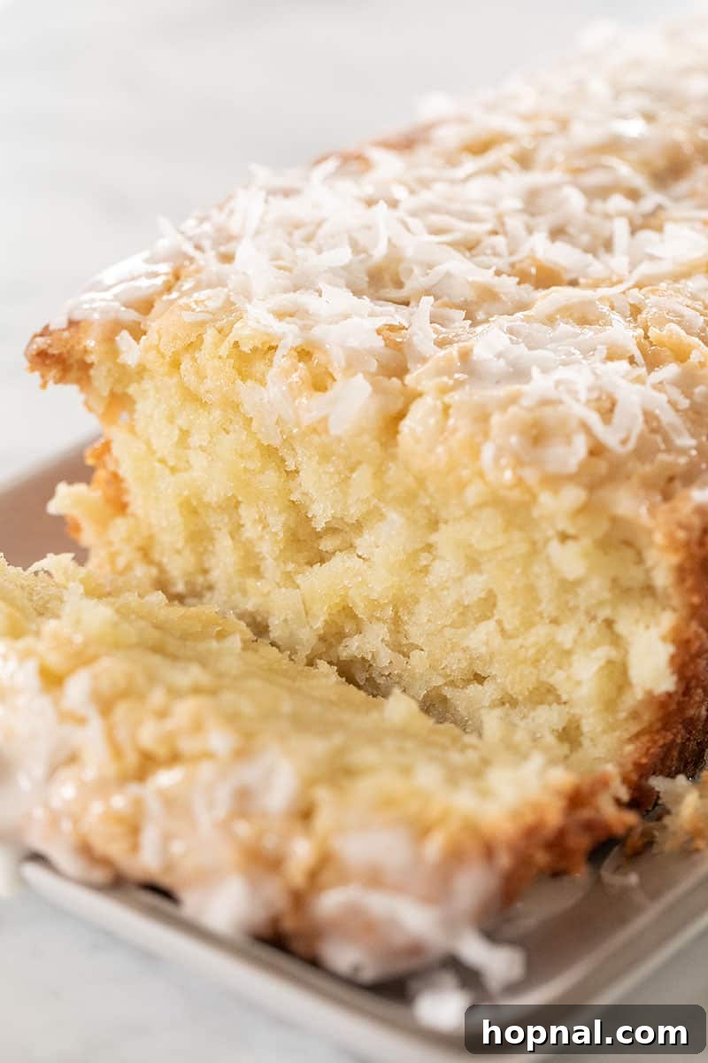 Your Ultimate Easter Recipe Collection 2 Moist and flavorful coconut loaf cake with homemade coconut glaze, perfect for Easter brunch or dessert.