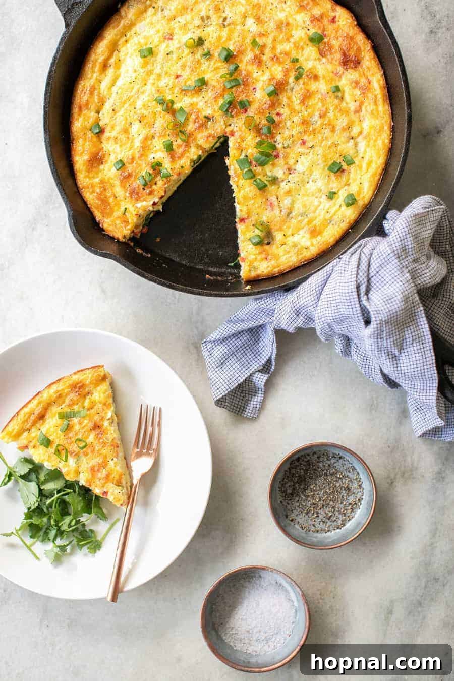 Your Ultimate Easter Recipe Collection 4 Delicious and easy frittata with spring vegetables on an Easter table.