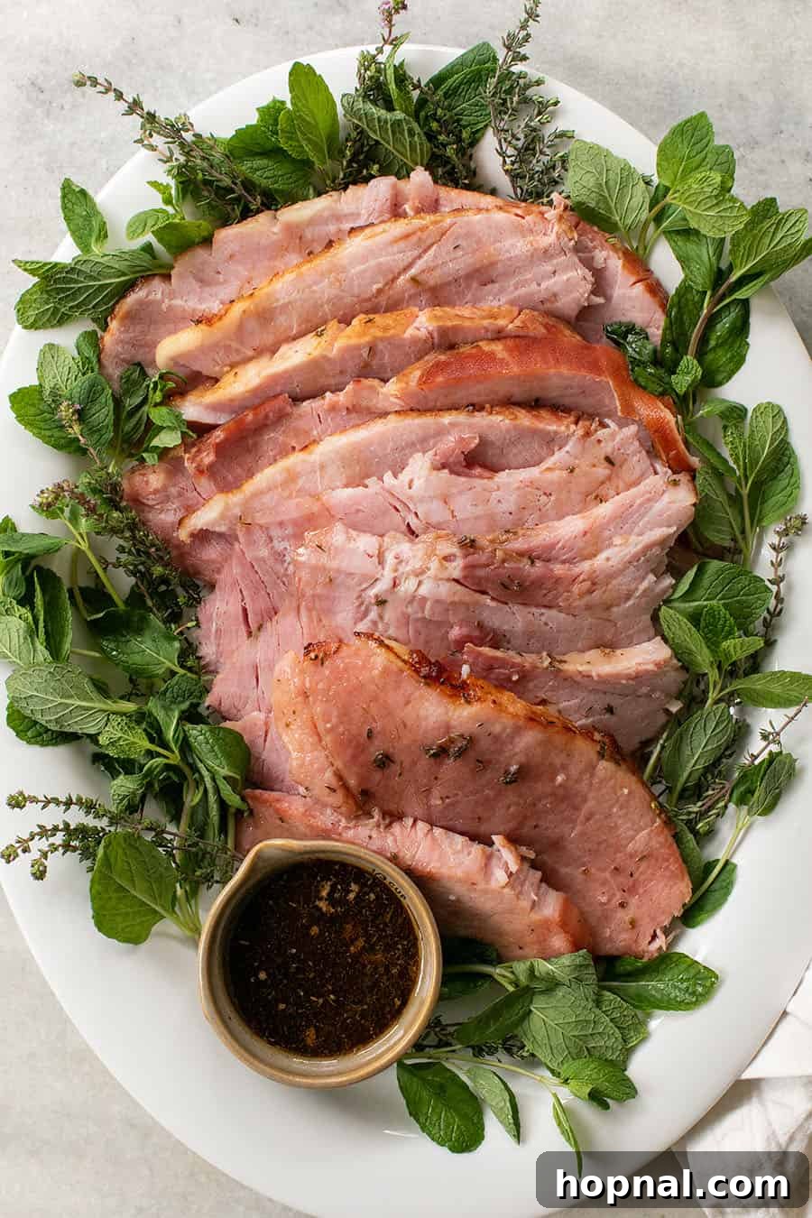 Your Ultimate Easter Recipe Collection 7 A perfectly baked honey-glazed ham on a platter, ready for Easter dinner or brunch.