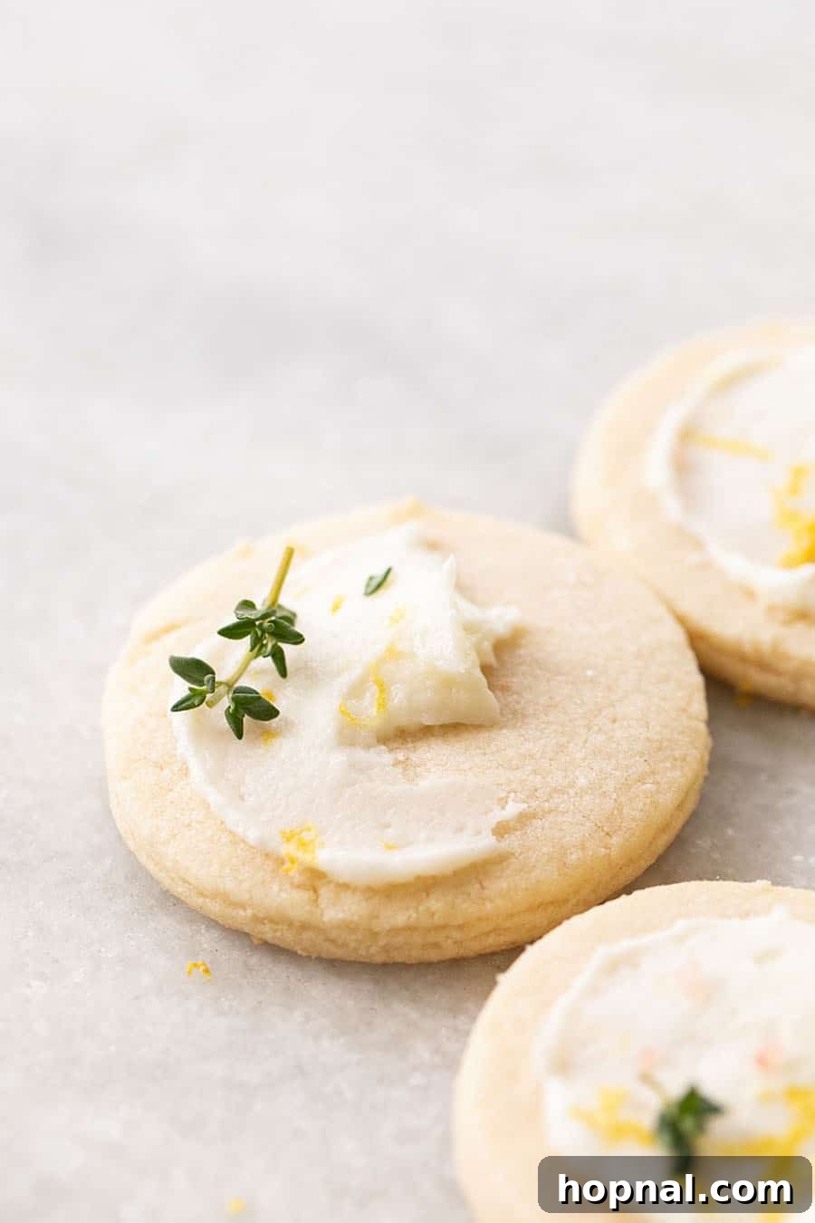 Buttery lemon and thyme shortbread cookies, perfectly baked and infused with aromatic flavors.