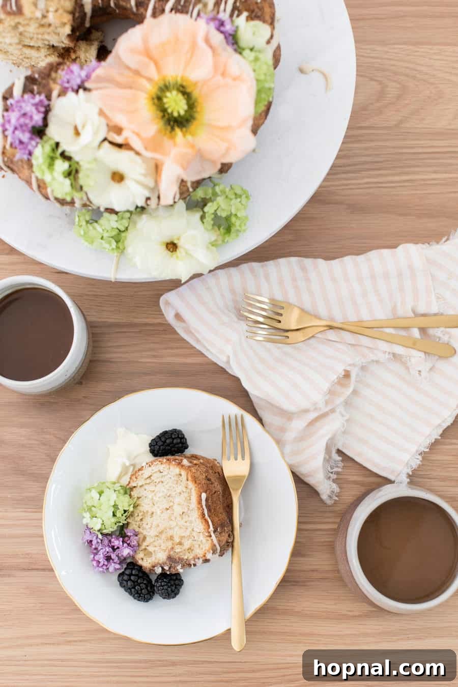 Slices of delicious coffee cake arranged on plates with pink napkins and cups of coffee, perfect for a cozy spring brunch.